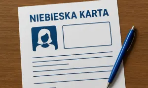 Niebieska karta co to? Dokument z miejscem na zdjęcie i dane, obok niebieski długopis.