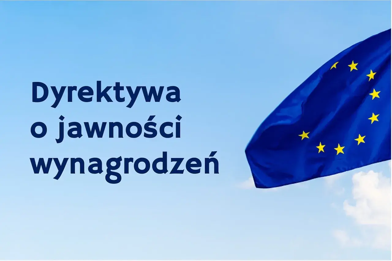 Dyrektywa o jawności wynagrodzeń od kiedy? Flaga UE na tle błękitnego nieba.