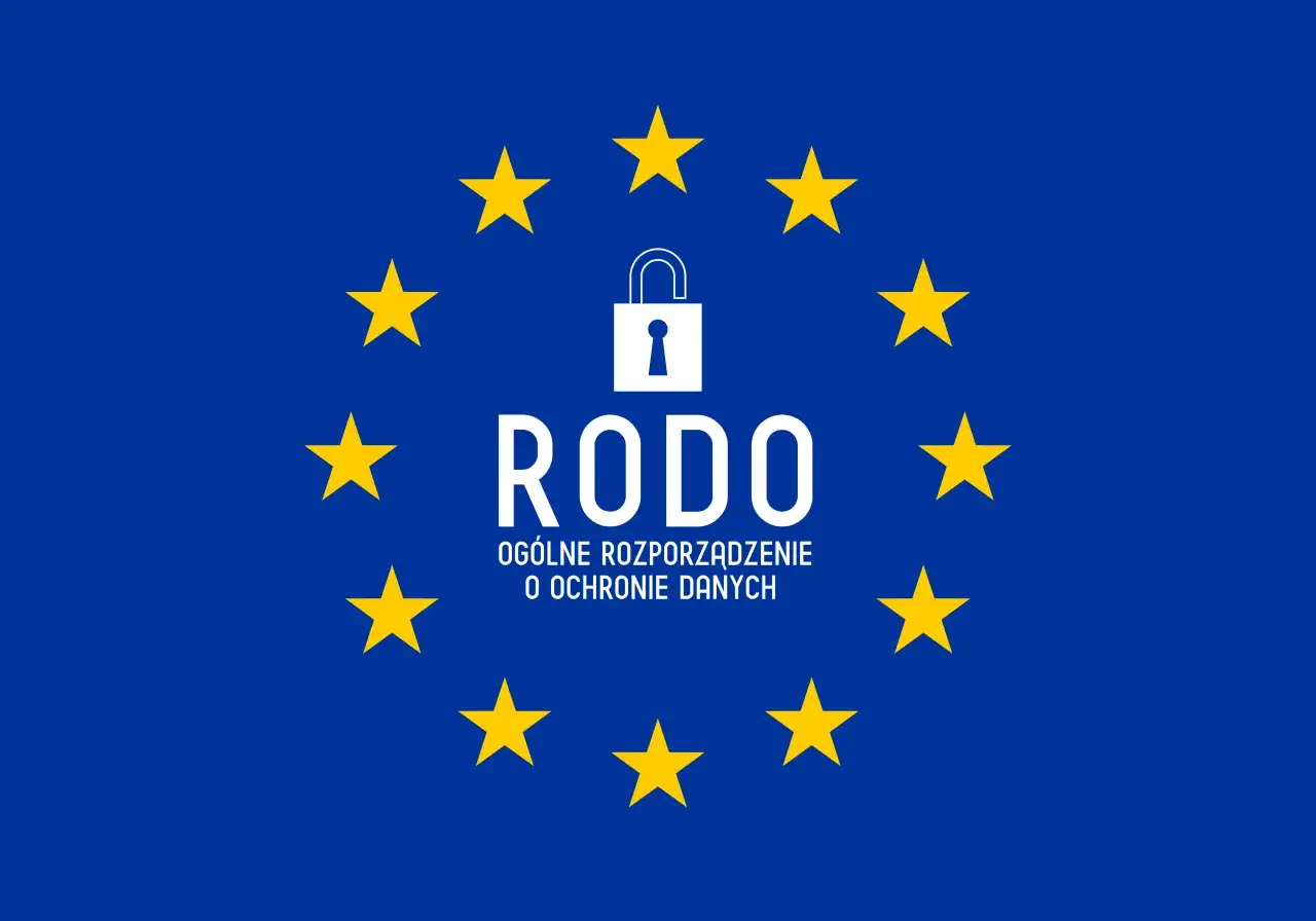 Flaga UE z symbolem kłódki i napisem RODO (Ogólne Rozporządzenie o Ochronie Danych).